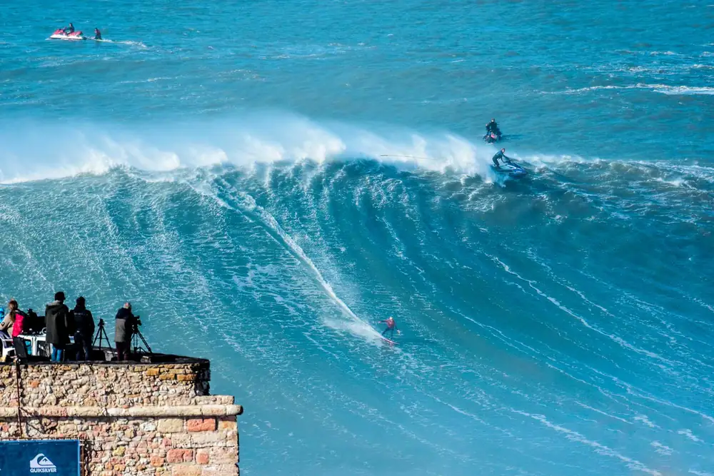 Big-wave surfer at Praia do Norte, Nazaré