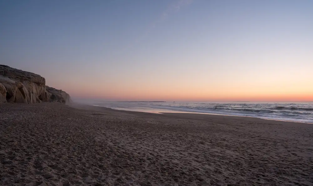 Sunset over the beach at Praia d’El Rey